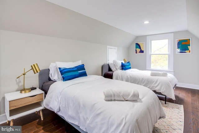 bedroom with vaulted ceiling, hardwood / wood-style floors, recessed lighting, and baseboards