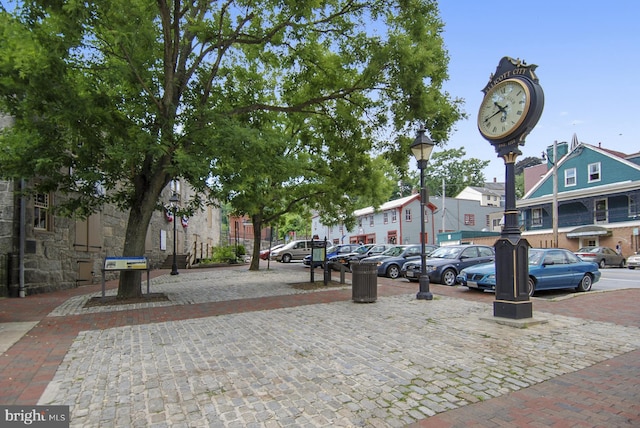 view of property's community with uncovered parking