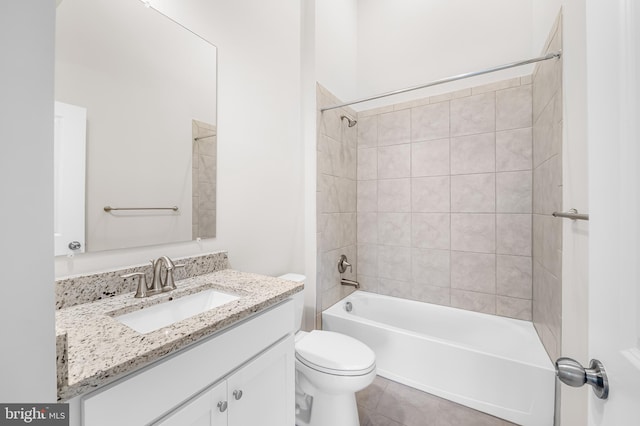 full bathroom featuring shower / bath combination, tile patterned flooring, vanity, and toilet