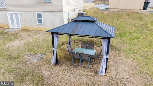 view of yard with cooling unit and a gazebo