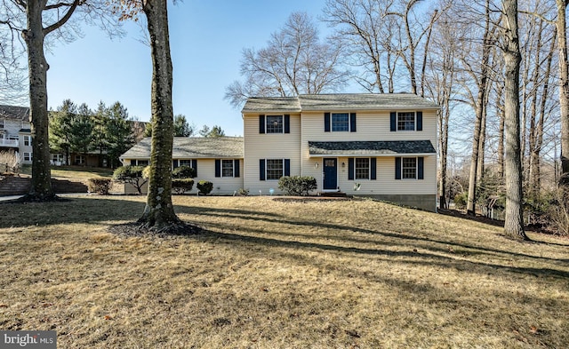 view of front of home with a front yard