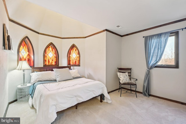 bedroom featuring light carpet, visible vents, crown molding, and baseboards