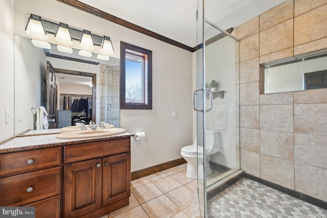 full bathroom with tile patterned flooring, a shower stall, vanity, and ornamental molding