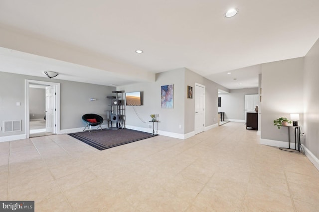 exercise room featuring recessed lighting, visible vents, and baseboards