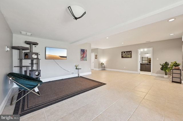 sitting room with tile patterned flooring, recessed lighting, visible vents, and baseboards