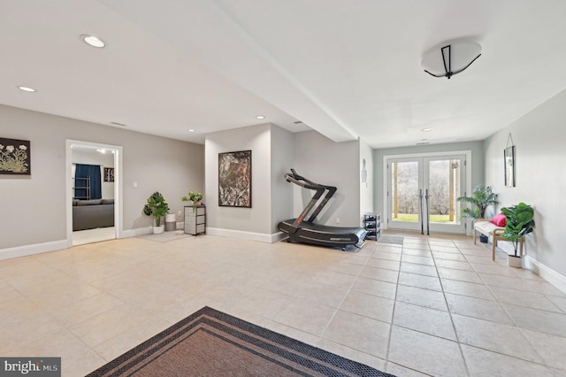 workout area featuring tile patterned floors, french doors, baseboards, and recessed lighting