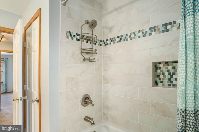 full bath featuring shower / bath combo with shower curtain