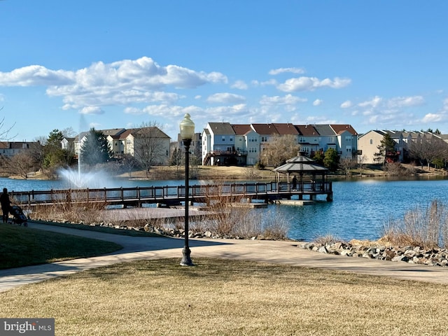 property view of water featuring a gazebo and a residential view