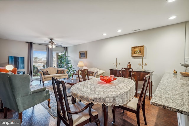 dining area with a ceiling fan, dark wood-style flooring, visible vents, and recessed lighting