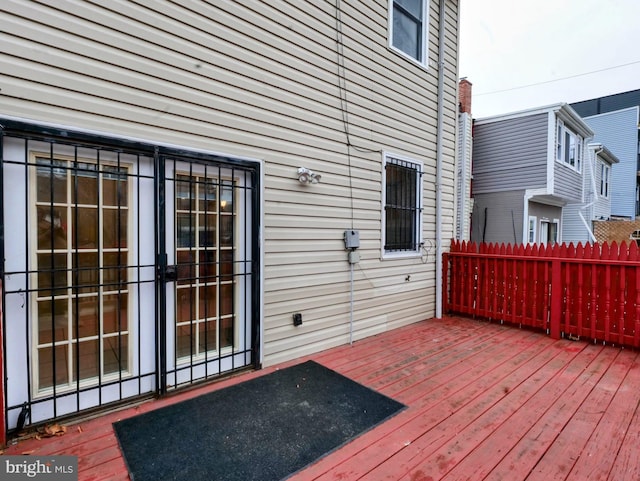 wooden deck featuring fence