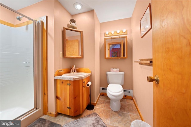 full bathroom with a baseboard heating unit, toilet, a stall shower, and vanity