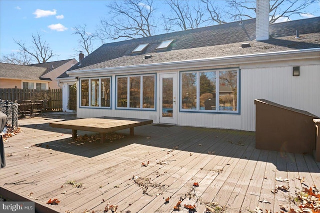 deck featuring fence and outdoor dining space