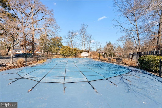 view of pool featuring a fenced in pool and fence