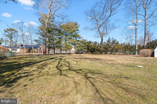 view of yard with fence