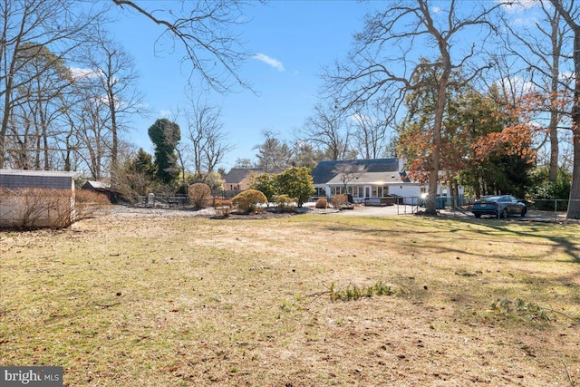 view of yard featuring fence