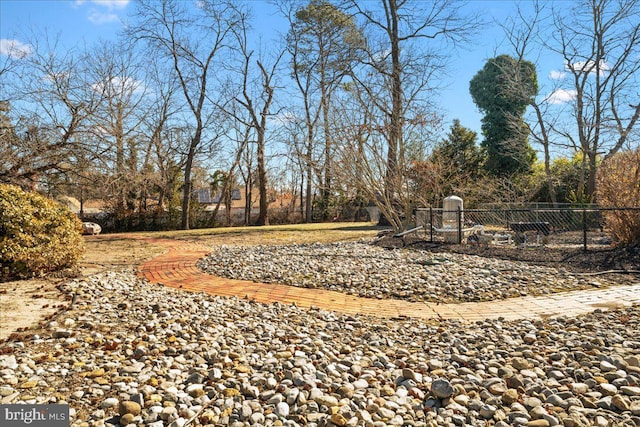 view of yard with fence