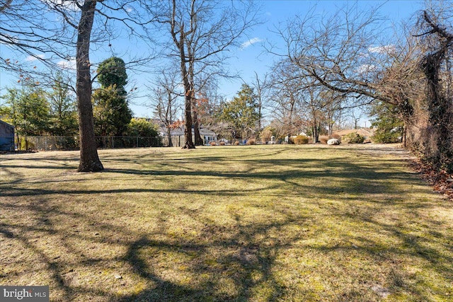 view of yard with fence