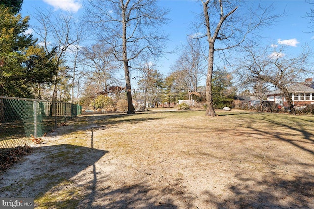 view of yard featuring fence