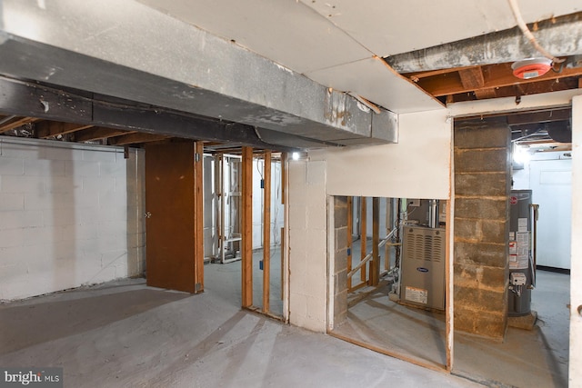 unfinished basement with water heater