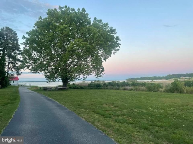 view of road featuring a water view