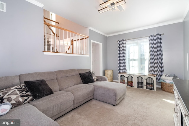 living area featuring visible vents, carpet floors, ornamental molding, and stairs