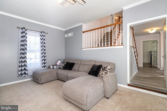 living area featuring visible vents, carpet, ornamental molding, and stairway