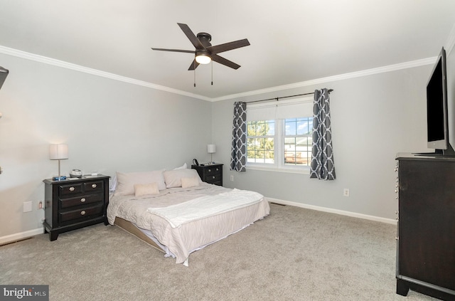 bedroom with baseboards, light colored carpet, and ornamental molding