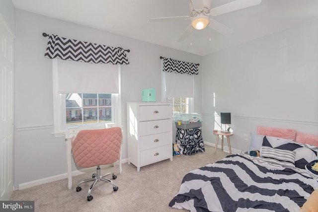 bedroom featuring carpet flooring, baseboards, and ceiling fan