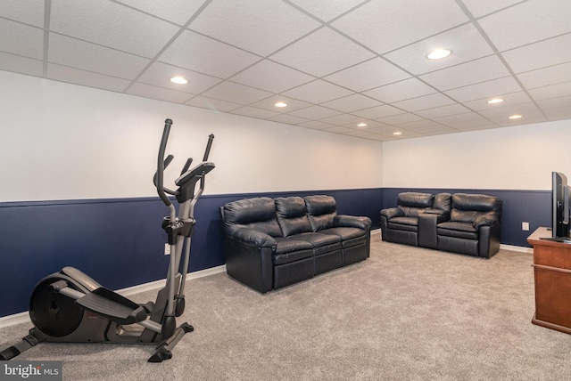 exercise area with recessed lighting, carpet flooring, a drop ceiling, and wainscoting