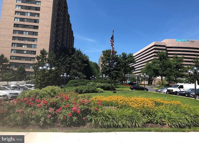 view of property with uncovered parking