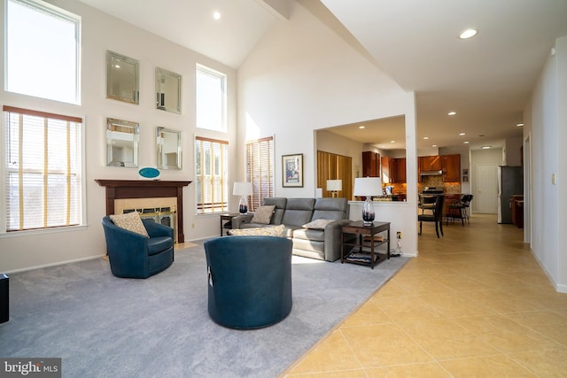 living room featuring light tile patterned floors, baseboards, a fireplace with flush hearth, and recessed lighting