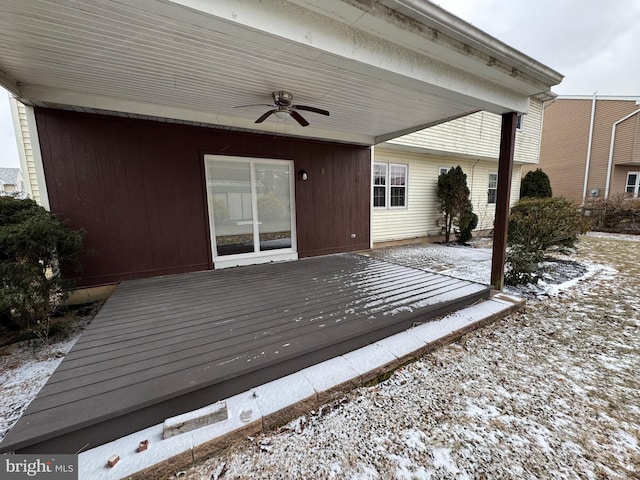 snow covered deck with ceiling fan