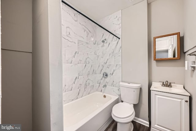 full bathroom featuring shower / washtub combination, baseboards, vanity, and toilet