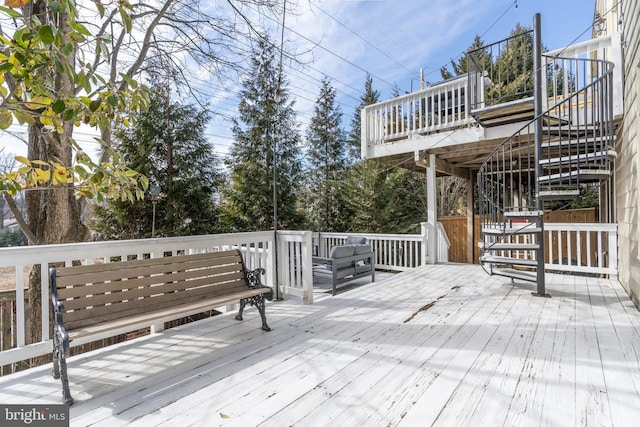 wooden terrace featuring stairs