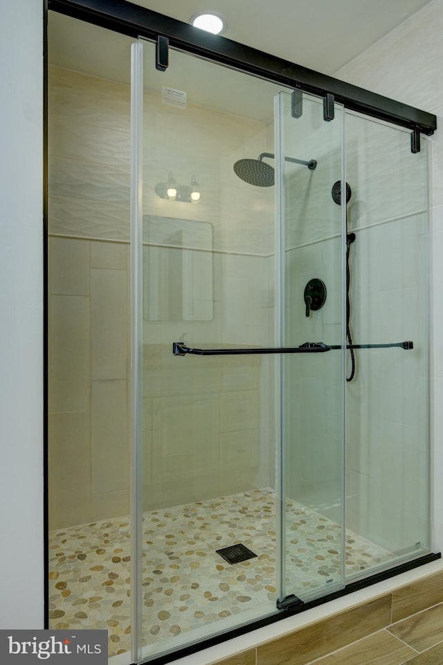 bathroom with a stall shower