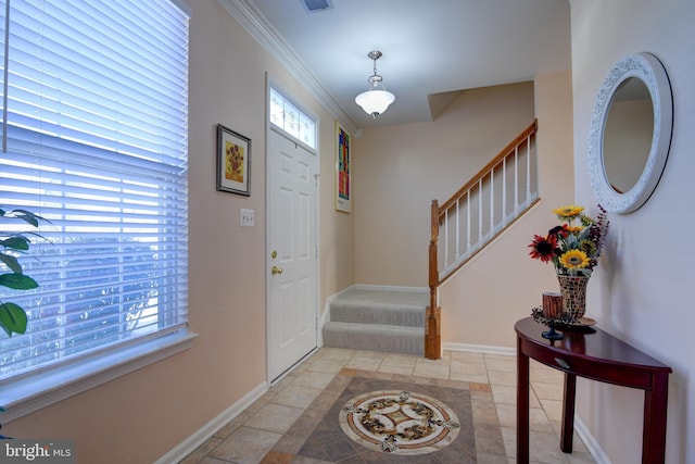 entryway featuring stairway, light tile patterned flooring, baseboards, and ornamental molding