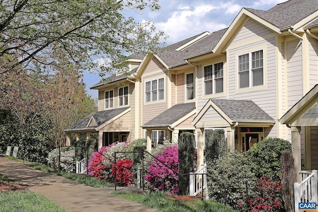 view of front facade with a shingled roof