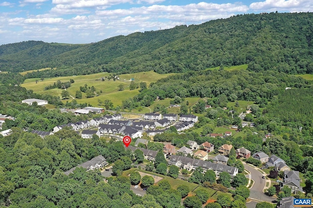 birds eye view of property with a mountain view and a residential view