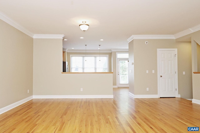 unfurnished living room featuring baseboards, ornamental molding, recessed lighting, and light wood-style floors