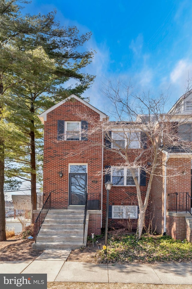 view of front of property with brick siding