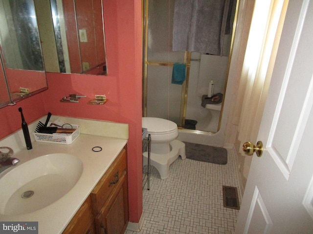 full bathroom with a stall shower, visible vents, toilet, tile patterned flooring, and vanity