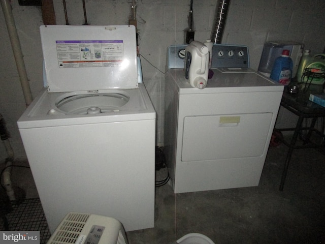 laundry area featuring laundry area and washing machine and clothes dryer