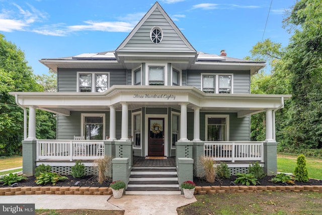 victorian-style house with covered porch