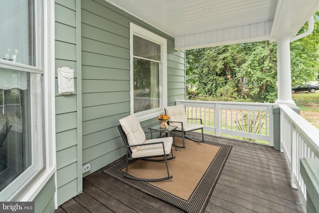 wooden deck with a porch