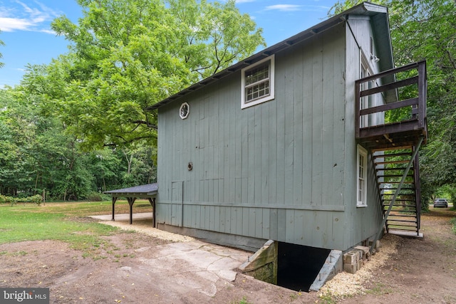 view of property exterior with stairway