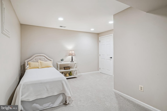 carpeted bedroom with baseboards, visible vents, and recessed lighting