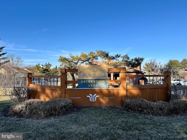 exterior space featuring fence and a yard