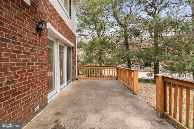 view of patio featuring fence