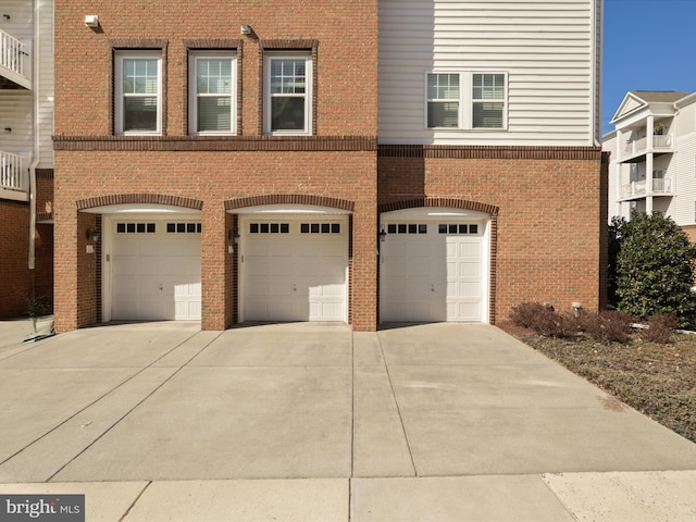 garage featuring driveway