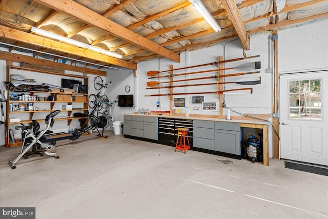 basement with a workshop area